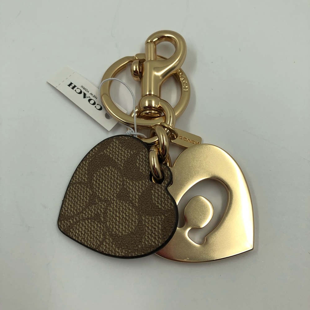 NWT - Coach Bag Charm / Key Ring in gold-metal and signature canvas.